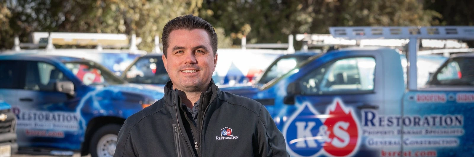 The KS Restoration owner invites new customers to contact him - wide crop